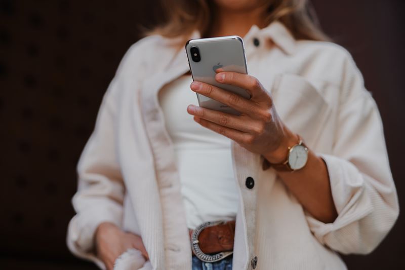 Woman Holding Smart Phone