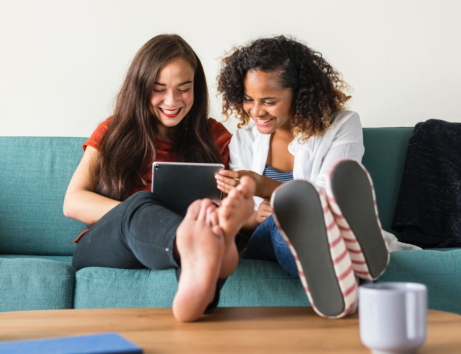 Two People Sitting on Couch